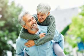 Life Assure Seniors Couple Piggyback Walk In Park Blog